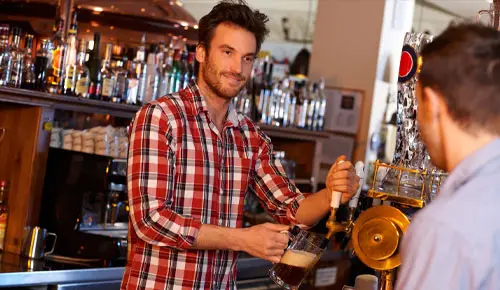 Capital People pulling pint